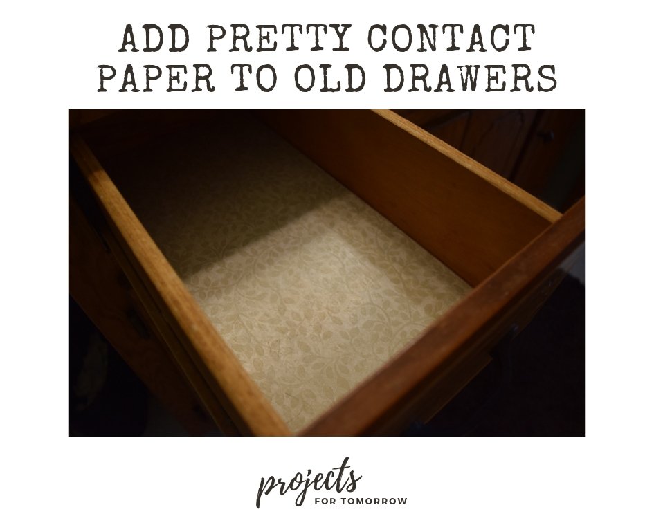 add pretty contact paper to old bathroom vanity drawers.