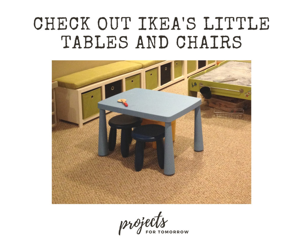 blue Ikea table and dark blue stools