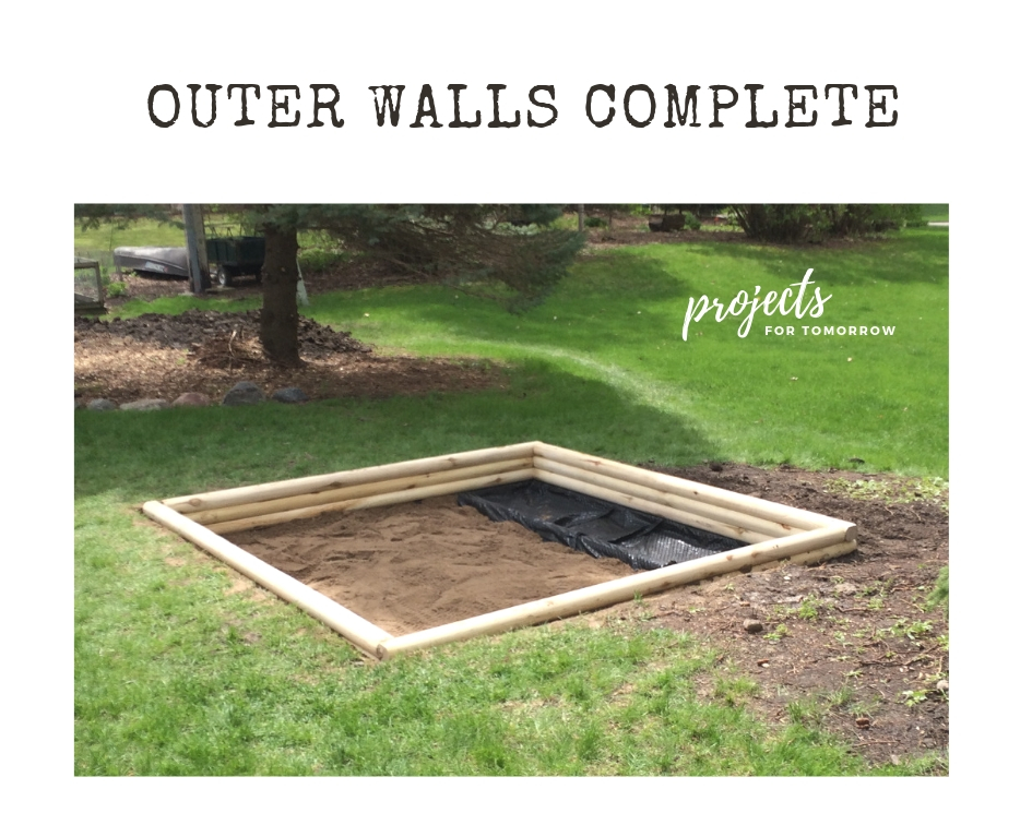 outer walls complete during the DIY sandbox project
