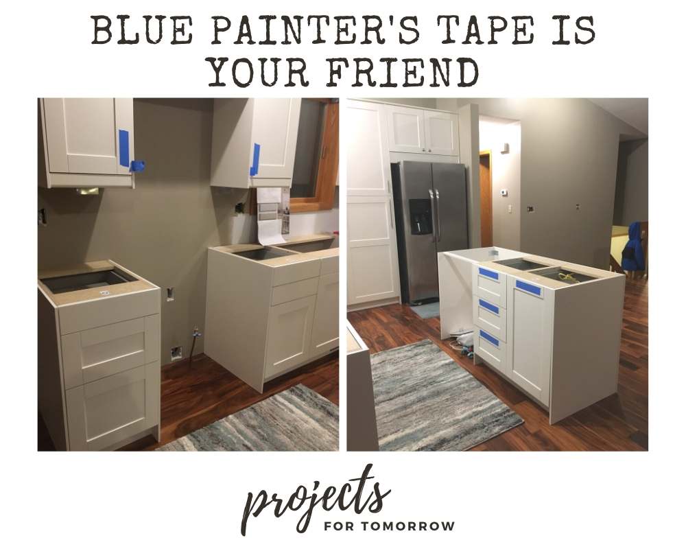 using blue painter's tape when installing kitchen hardware